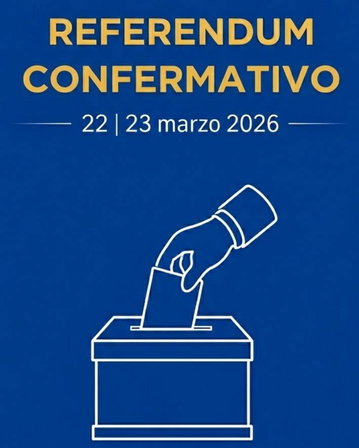 Grafica informativa del Referendum Confermativo del 22 e 23 marzo 2026. Testo: 'REFERENDUM CONFERMATIVO - 22 | 23 marzo 2026'. Sotto il testo, un'icona stilizzata a linee bianche raffigura una mano che inserisce una scheda elettorale in un'urna. Lo sfondo è di colore blu istituzionale uniforme
